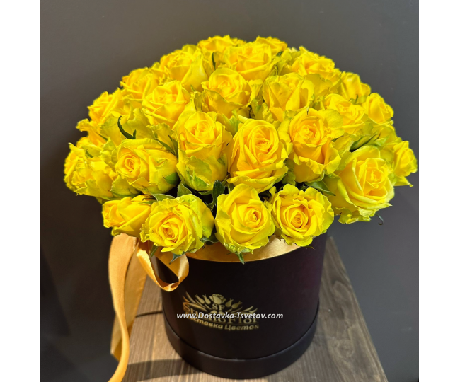 In the box Yellow roses "Radiant"
