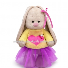 Bunny Mi in a sweater with a heart